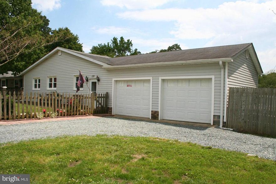 Recently remodeled rancher w/possible 4th bedroom in basement, man cave or shop!  House has newer vinyl windows. Solar panels are owned/not rented - Get Your Energy Credits Now!! Water access community beach.  There is a 2 car garage.  Fenced yard with room for swimming pool.  Large deck great for cookouts & parties. Parking for 4 cars as well as on street parking.