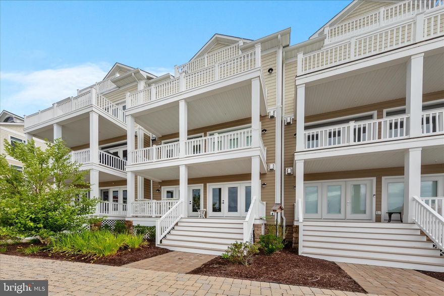Walking distance to the finest local dining establishment's this is the pinnacle of Modern Bay Front living at its finest. Welcome to a lifestyle of effortless relaxation offering the perfect balance of luxury, water and family-friendly living. This bright airy, open - concept floor plan connects directly to numerous decks, and spectacular views of Eastern Bay. Community offers private marina, boat docking slips, kayaking, fishing, community pool.  Located in sought after Wells Cove Community representing the pinnacle of seaside living. This high-performance quality craftsmanship home has an abundance of options that include ultra-high energy efficiency, innovative floor plan, white marbled tiled coastal floors, shiplap and wainscoting throughout, gourmet kitchen with professional grade appliances, full wet bar, dry bar, custom cabinetry throughout and vaulted and beamed ceilings This home is setup for effortless entertaining. Owner has delivered personal touches that make it a truly special three-year-old home in Model New Condition a water lover's dream!!!  The home has rarely been used, and the Range has never been used. This essentially like-new home is a best value Townhome/Condo in all of Kent Island. Come look at our home and compare to new waterfront homes and experience the difference, I think we will win you over!!! Home was loaded with over $400,000 in changes and options when originally constructed. Owner added an abundance of details up and above the builder upgrades. A must-see dream home!!! Owner will consider selling furnished and selling separately deeded boat slip.