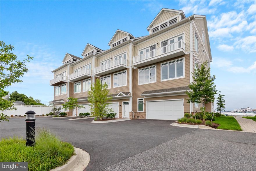 Walking distance to the finest local dining establishment's this is the pinnacle of Modern Bay Front living at its finest. Welcome to a lifestyle of effortless relaxation offering the perfect balance of luxury, water and family-friendly living. This bright airy, open - concept floor plan connects directly to numerous decks, and spectacular views of Eastern Bay. Community offers private marina, boat docking slips, kayaking, fishing, community pool.  Located in sought after Wells Cove Community representing the pinnacle of seaside living. This high-performance quality craftsmanship home has an abundance of options that include ultra-high energy efficiency, innovative floor plan, white marbled tiled coastal floors, shiplap and wainscoting throughout, gourmet kitchen with professional grade appliances, full wet bar, dry bar, custom cabinetry throughout and vaulted and beamed ceilings This home is setup for effortless entertaining. Owner has delivered personal touches that make it a truly special three-year-old home in Model New Condition a water lover's dream!!!