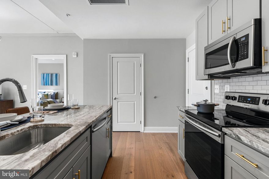 LIMITED TIME: 1/2 a month of FREE RENT. Some restrictions apply. Welcome to RIVER WALK NORTH! Every element of modern living is seamlessly integrated to create a community that offers unparalleled comfort and convenience. From the moment you arrive, you’ll be greeted by the sleek design of the first of three 26-story, all-glass towers that make up this impressive residential complex. The spacious kitchen features sleek countertops, WATERFALL ISLANDS, STAINLESS STEEL appliances, expansive BREAKFAST BAR, perfect for both cooking and entertaining, and HIGH-END FINISHES throughout. HARDWOOD FLOORING runs throughout the living spaces, adding warmth and style, while HIGH CEILINGS and FLOOR-TO-CEILING WINDOWS bathe each home in natural light. Solar shades ensure your comfort and privacy, while offering energy efficiency. Many residences also come with PRIVATE BALCONIES or terraces, allowing you to enjoy the vibrant city views and relax in your own outdoor space. The DESIGNER BATHROOMS feature luxurious touches, such as subway tile, glass-enclosed showers, and modern fixtures. The building is equipped with 24/7 FRONT DESK ATTENDANTS, PACKAGE ACCEPTANCE, and on-site management to ensure your needs are always met. Additionally an online resident portal for easy rent payments and work order entries make daily life even more convenient. For EXTRA STORAGE, there are resident storage units and BIKE STORAGE available, making it easy to keep your belongings organized. With OVER 50,000 SQUARE FEET OF AMENITIES, you'll have access to everything you need. Private resident SPORTS COURTS cater to all levels of play, while the stunning INFINITY POOL with SUN TERRACES offers an oasis to relax and enjoy the BREATHTAKING VIEWS of the Schuylkill River and Philadelphia's iconic skyline. Fitness is made easy with a STATE-OF-THE-ART FITNESS CENTER, yoga, Pilates, & cycling studio. For those who work from home or need a space to concentrate, the CO-WORKING SPACE AND PRIVATE OFFICE PODS provide a comfortable and efficient work environment. And of course, GARAGE PARKING is available for your convenience. When hunger strikes, you won’t have to look far. River Walk is home to a FLAGSHIP GIANT™ SUPERMARKET, offering GROCERY DELIVERY, along with a prepared food bar for quick meals. For dining options included Hissho Sushi Bar, Saladworks, Super Hong Kong Chef, and the Giant Pub, where you can enjoy a wide selection of 60 beers on tap. You’ll also find a STARBUCKS™, so you can enjoy your favorite coffee drinks without leaving home. The RESIDENT LOUNGE has a COMMUNITY KITCHEN, and there is a OUTDOOR PICNIC PATIO. With PET-FRIENDLY accommodations and on-site pet care, your four-legged friends will feel right at home, too. Located just minutes from Philadelphia’s renowned arts and culture scene, including the Academy of Natural Sciences, The Franklin Institute, The Rodin Museum, & The Barnes Foundation. When it’s time to shop, you’ll be close to Rittenhouse Square and world-class stores like Target, Sephora, Nordstrom Rack, Boyd’s, Apple, & The Shops at Liberty Place. For dining, indulge in local favorites such as Vernick Fish, Jean Georges, Walnut Street Café, Moustaki, Friday Saturday Sunday, & Dizengoff. With major employers at Comcast Center, Cira Centre, Aramark, & nearby hospitals like Hospital of the University of Pennsylvania & Children’s Hospital of Philadelphia (CHOP), you’ll be centrally located for work & play. Universities such as University of Pennsylvania, Drexel University, and USciences are also nearby, making this location perfect for students & faculty alike. With easy access to Fairmount Park, Schuylkill River Park, Love Park, & Penn Park, as well as the Schuylkill River Trail, green spaces abound for outdoor enthusiasts. Getting around is a breeze, thanks to nearby transit options like 30th Street Station, Suburban Station, & major highways like I-95, I-76, and I-676. The photos showcase the model unit.