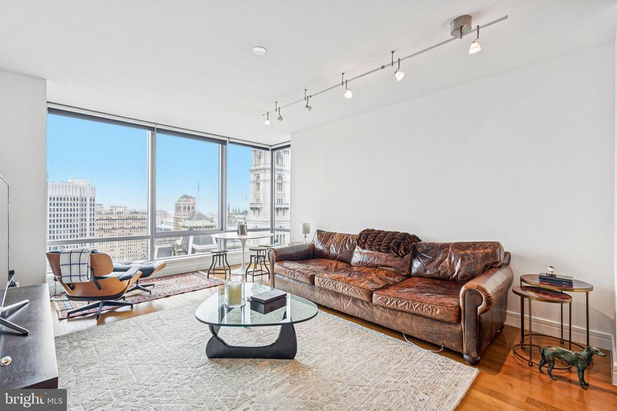 THE ULTIMATE IN LUXURY – This magnificent one bedroom, one and a half bath residence is not to be missed. The living and dining areas feature soaring ceiling heights, gleaming hardwood floors, and a wall of windows that flood the home with natural light. Perfectly situated above the city,  this  pristine unit offers unparalleled  views of the intricate architectural details of CITY HALL and DILWORTH PLAZA.  The chef’s kitchen boasts granite counters, VIKING, MIELE, and SUBZERO appliances, and a convenient kitchen island. The bedroom suite features ample closet space and a lavish en-suite marble bath with double sinks, a large BAIN ULTRA soaking tub, and a separate walk-in shower with frameless shower door. Association fees include a 24 hour concierge, chauffeur-driven car service, state-of-the-art fitness center, pool with hot tub, and residents' lounge with outdoor terrace. Located in the Rittenhouse and Avenue of the Arts area, this pet-friendly residence at THE RESIDENCES AT THE RITZ CARLTON is in the center of it all. World-renowned cultural destinations, one of a kind shopping, exciting nightlife and fine dining are all right at your doorstep.