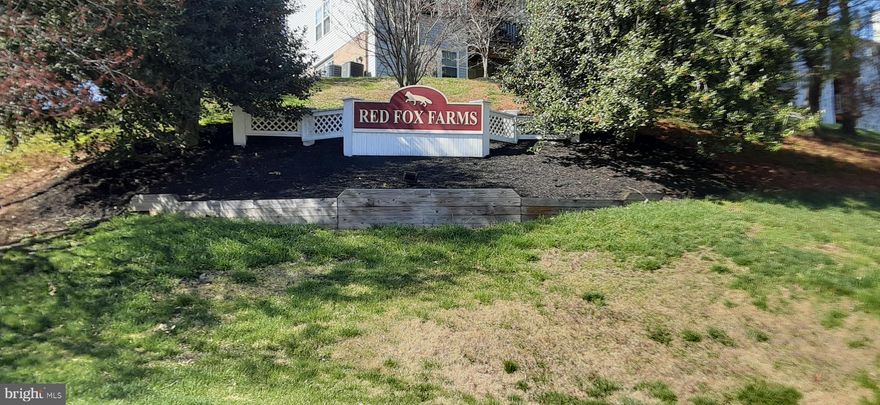 WELL MAINTAINED MIDDLE-LEVEL 1 BEDROOM, 1 BATH CONDOMINIUM UNIT LOCATED IN PERRY HALL'S BEAUTIFUL RED FOX FARMS COMMUNITY!  818 SQUARE FEET OF LIVING SPACE INCLUDING THE DEN/OFFICE!   DEN/OFFICE WAS PREVIOUSLY USED AS A GUEST BEDROOM.  FRESHLY PAINTED THROUGHOUT, SPACIOUS LIVING ROOM/DINING ROOM COMBINATION WITH SLIDER ACCESS TO THE 9' X 6' COVERED BALCONY WITH GORGEOUS VIEWS OF OPEN SPACE AND  FEATURES AN EXTRA STORAGE CLOSET WITH SHELVING,  BRIGHT KITCHEN W/ ATTRACTIVE COUNTERTOPS, WOOD CABINETRY AND BAR SEATING, BEAUTIFULLY  REMODELED FULL BATHROOM COMPLETED IN 2022,  LAUNDRY ROOM IN UNIT WITH FULL SIZE WASHER AND DRYER, SECURE ENTRANCE TO BUILDING WITH INTERCOM, AN ASSIGNED PARKING SPOT (#26) AND VISITOR PARKING SPOTS ARE PLENTIFUL, WONDERFUL OPPORTUNITY TO OWN AT AN AFORDABLE PRICE!  CLOSE TO SHOPPING, RESTAURANTS AND THE  NEARBY PLANET FITNESS GYM!  SERENE & QUIET SETTING!  CLOSE TO GUNPOWDER STATE PARK!  THIS UNIT HAS WINDOW VIEWS OF BOTH THE FRONT AND REAR OF BUILDING!