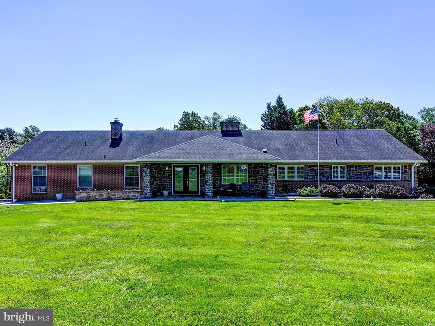 YOU NEED TO SEE THIS FOR YOURSELF!!! 
Attention to detail shows everywhere in this 5 Br, 4.5 BA rancher where everything has been redesigned, remodeled and upgraded throughout from the covered front entry to the special
Interior! The upper level has 4 bedrooms. And there is 1 more bedroom (currently being used as the poker table game room) in the lower, walkout level. Also included in the lower level is the rec room area with a bar, a big laundry room, full bath, utility & storage area, and convenient to walk out to the pool area. Every door in this home has been replaced with European-designed doors, stunning bathrooms, mahogany floors throughout, new HVAC systems, a brand-new large water heater, new
 kitchen & appliances, new fencing, and cabinetry in the entire home has been upgraded. Plus--- the original home has doubled in size with easy living and entertaining in mind! Huge,
 spacious rooms, additions, 2 driveways! - one directly to the refloored oversized 2 car garage with a Tesla charger. The ground level attached wine room/pool house boasts a covered rear
 patio off the living room overlooking the inground pool and fenced yard. All electric and water services have been improved. The entire home is serviced by an ethernet service and an
 extensive security system (camera & lights). Also included are the solar panels, the full house generator, kitchen water purifier, 3 zoned A/C, 2-sided f/p, main level TV room, insulated walls, and extra land included on side of home.