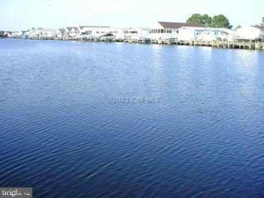 Beautiful Water Front Building Lot with Boat Slip in Front of Property. this Lot is Located on Very Wide Lagoon. Montego Bay Community offers 2 Pools and 2 Tennis Courts.