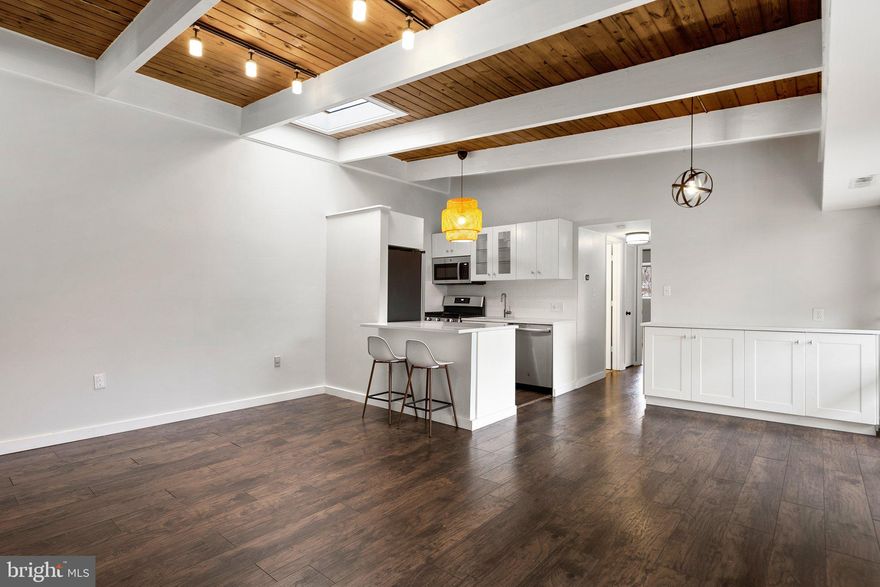 BEST OF KENSINGTON!  2 bedroom and 1 full bathroom.  Don't wait to view this beauty. This home is move in ready. All one level. Freshly painted.  New vinyl plank flooring throughout.   Recently renovated kitchen and bathroom.  Smart home features throughout the home.  Update balcony with great view.  Private storage unit in building.  Assigned parking space.  Ideally located, close to shopping, restaurants, parks, and so much more. A perfect place to call home.