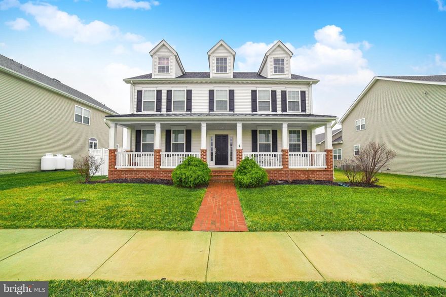 Beautiful Mattingly model w/gourmet KT, gas fpl, ceramic tile & hrdwd floors on entire main lvl. MBR suite w/walk in closets, & deluxe bath  Fully finished bsmnt w/ bedroom, rec room wired for theater, full bath and storage areas. Fully fenced yard 2 car grg, located on the village green means extra outdoor space & peaceful view. Enjoy watching the community festivities from your front porch!!