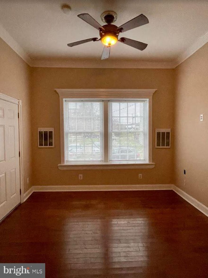 Charming and cozy, light-filled apartment that features 2 bedrooms and 1 full bath! With an open concept living/dining/kitchen, the hardwood floors gleam with the natural light that streams in from the large window in the living room. The eat-in kitchen has solid wood cabinets and complete stainless steel appliances. All the bedrooms have ample closet space and large windows. The basement is accessible by all tenants and can be used for storage. Water is included in the rent, so the tenant only pays for electricity. This pet-friendly flat is rent-ready!