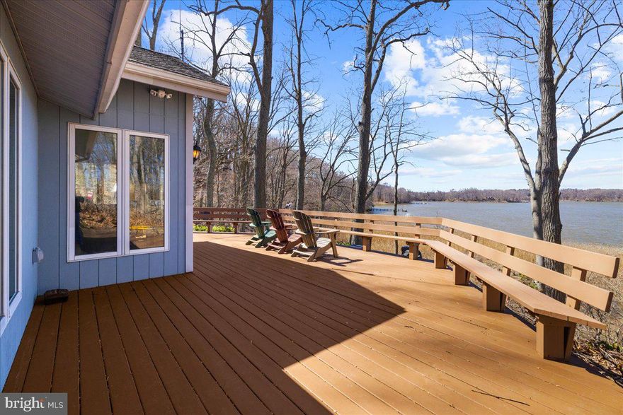 This Waterfront Contemporary home is nestled on a bluff with sweeping views of Still Pond Creek. The property checks all of the boxes for your retreat including a well maintained deck, screened river room for crab feasts, private sandy beach and dock with several boat lifts.  The living room has a cathedral ceiling, wood burning fireplace, and glass sliders leading you to the deck with incredible views of nature and wildlife. One of the 3 main floor bedrooms, the primary suite has an ensuite bathroom, walk-in closet, and full length windows to celebrate the property's connection with the water. On the lower level you will find another bedroom, den, workshop, and garage.  Upgrades include New Heating and Cooling (2024&2025), New Roof (2022), Garage Door (2024), Plumbing and Electrical Updates (2022), Generator, Rinnai Tankless hot water heater, and Reverse Osmosis water treatment.  Still Pond Creek provides direct access to the open waters of the Chesapeake Bay for prime boating opportunities however is a protected tributary making it great for water sports.  The property is located in the rolling farmlands of Worton,  only 15 minutes from the shops, restaurants, and galleries of downtown historic Chestertown.   Philadelphia, Washington D.C., and Baltimore are all less than a 2 hour drive making this perfect for a weekend getaway or year round residence.