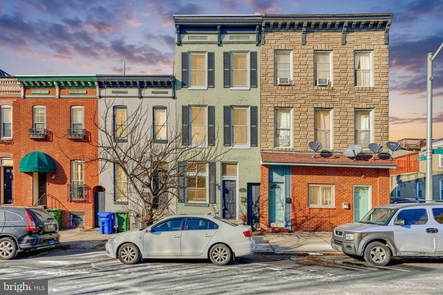 Centrally located in the heart of Canton, this spacious home offers approximately 1,898 square feet of character and comfort. The main level features an open floor plan highlighted by exposed brick, wood beams, wood floors, and a cozy wood‑burning fireplace. A long, well‑designed kitchen flows into a side dining area, creating a unique and inviting space for everyday living and entertaining. A convenient half bath completes this level. The second floor includes two bedrooms, a full bath, and a separate laundry room. The third floor is dedicated to the primary suite, offering privacy, generous space, and access to the expansive rooftop with sweeping city views. With its distinctive charm, thoughtful layout, and impressive square footage, this home delivers the best of Canton living.