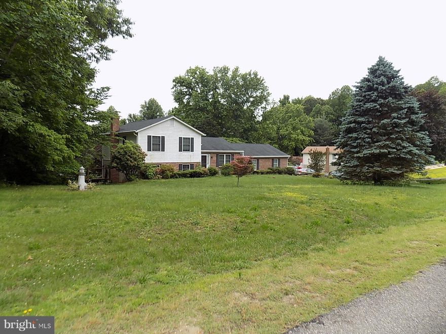 Sought after Huntingtown school district.  Cul-de-sac location.  No HOA.  Garage has a bedroom, can be easily converted back to a 2 car garage or leave as 4th bedroom.   Composite Rear Deck. Detached garage/workshop with electric, AC and separate driveway.