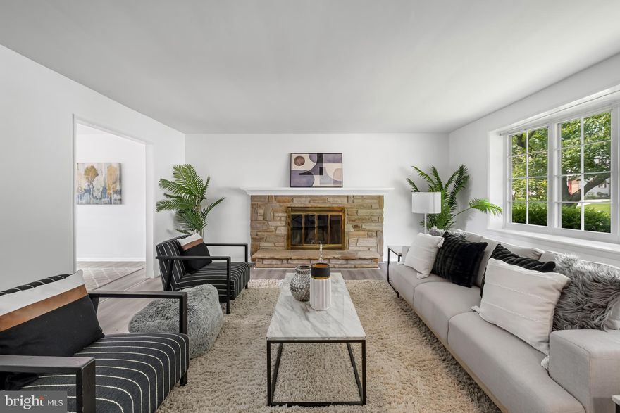 Tucked into the heart of the sought-after Springlake community, 2519 Lawnside Road in Timonium is a beautifully updated split-level home offering four levels of versatile living space. Built in 1965 and lovingly maintained by the original owners, this modified Somerset model sits on a picturesque corner lot and boasts 4 bedrooms, 2.5 baths, and over 2,780 square feet of space. The home’s thoughtful upgrades include new luxury vinyl plank flooring, fresh paint, modern lighting, and a 2021 HVAC system. The kitchen shines with granite countertops, a breakfast bar, and eat-in space perfect for casual meals.
The layout offers flexibility, with the garage-level den easily serving as a fourth bedroom or home office. The spacious family room features a custom brick fireplace, while the formal living room showcases a stone fireplace—both adding warmth and character. Upstairs, three bedrooms include a primary suite with a renovated bath and clever window modifications in bedroom two for enhanced furniture placement. Bathrooms throughout the home have been refreshed with updated fixtures and finishes. The lowest level includes a finished ceiling with overhead lighting, knotty pine cabinetry for ample storage, and a laundry area with a new washer and recent dryer. Outside, enjoy a landscaped 0.25-acre lot with sidewalks and access to the Springlake Pool and neighborhood amenities. The oversized garage offers extra depth and storage, and the concrete driveway provides additional parking. Located just off Pot Spring Road, this home offers easy access to major commuter routes and is served by top-rated schools including Pot Spring Elementary, Ridgely Middle, and Dulaney High. With timeless charm, modern updates, and a prime location, 2519 Lawnside Road is a rare opportunity to own a piece of Springlake’s legacy.