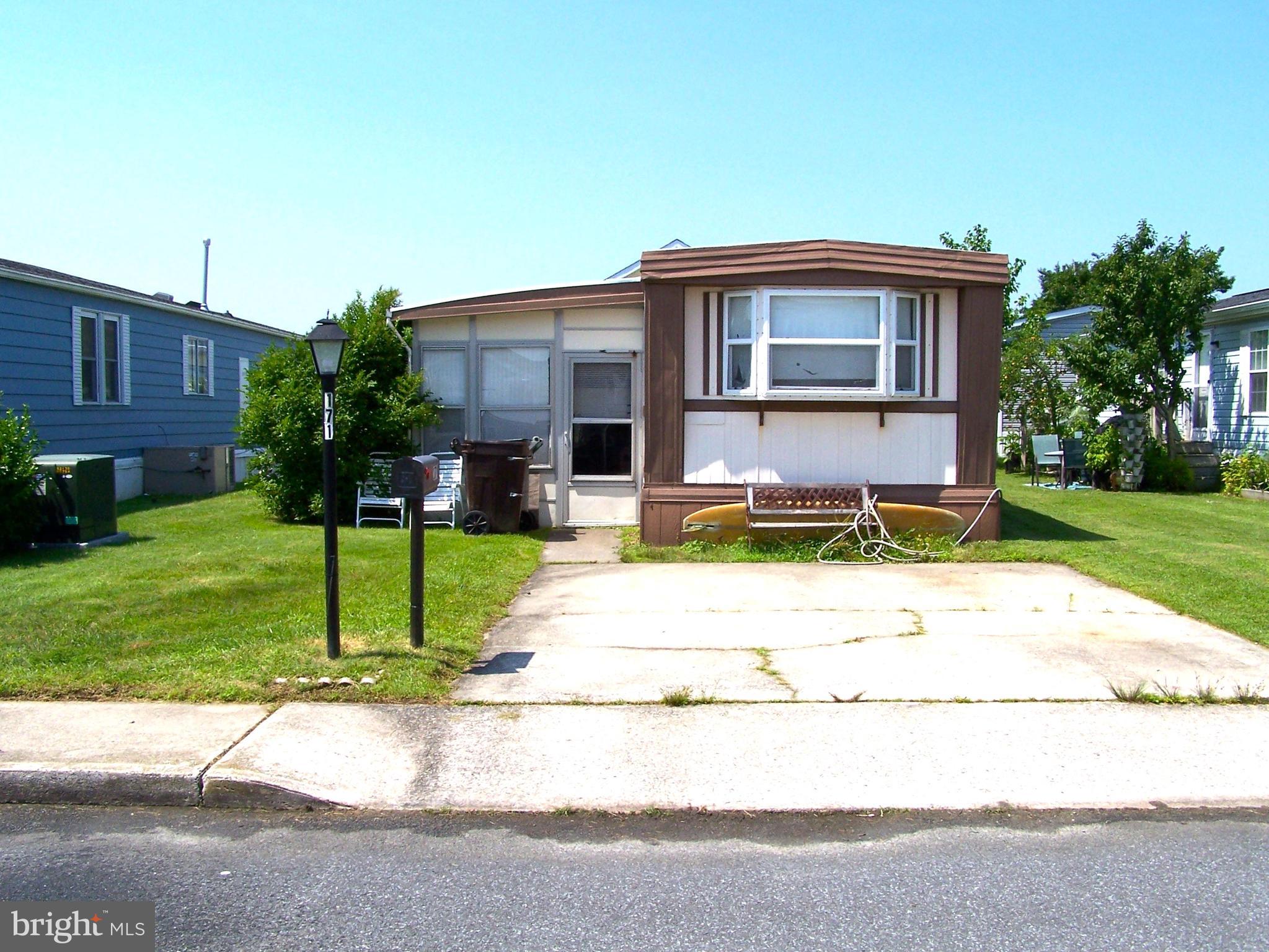 Prime building lot located in the highly sought after community of Montego Bay in North OC. Within walking distance to the beach as well as shopping, dining, bus stop, and Ocean City's 58 acre Northside Park (home of the 4th of July fireworks). Come build your dream home just steps away from some of the many amenities that the community has to offer. Community amenities include 2 inground swimming pools, 1 kiddie pool, 2 tennis courts, pickle ball courts, shuffleboard court, 9 hole mini-golf course, 8 acre wildlife sanctuary/park area, a 5 acre pond with a blacktop walking/jogging trail, and a bayfront boardwalk with 3 fishing/crabbing piers...all for a low HOA fee of $385.00 a year!!
Only the lot is for sale!! Existing mobile home is currently leased until Sept.1st at which point the sellers have contracted to have the mobile home demolished/removed from the lot.