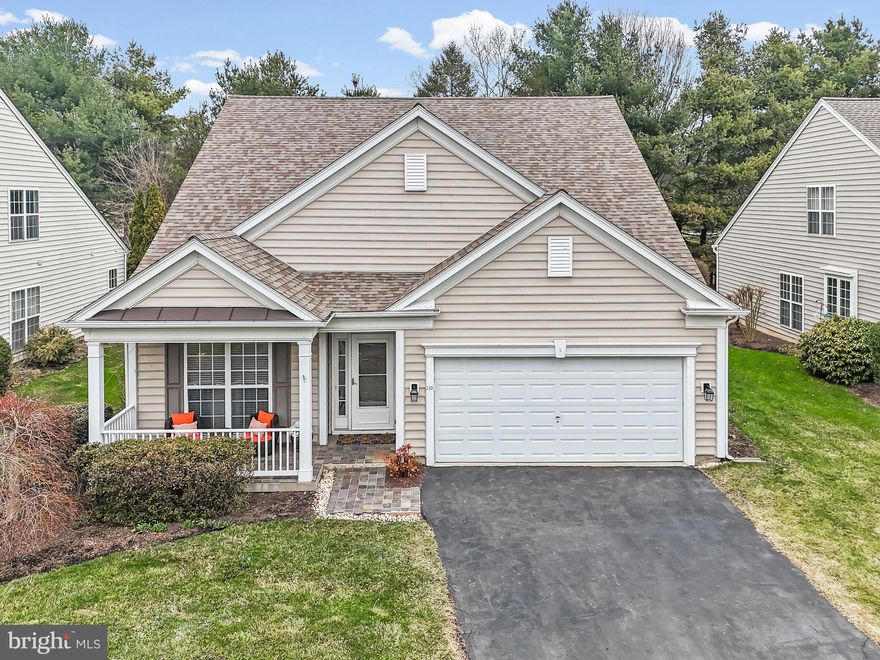 Located in Chester County's premier 55+ community, Traditions at Longwood, this meticulously maintained home is close to Longwood Gardens, West Chester, and is not too far from Wilmington and Philadelphia. From the time you pull up to the home, to the time you complete your tour, you will be impressed with the immaculate condition of the property, the soaring ceilings in the family room, and the wonderful molding and architectural details throughout. The formal living and dining rooms are located just off the main entry. The large kitchen is open to the family room which has a glass window wall and a soaring, two story natural gas fireplace. Just on the other side of the family room is the primary bedroom suite, conveniently located in the back of the home boasting a walk in closet plus a wonderful en-suite bathroom with large, walk-in shower, and a linen closet. The second bedroom, full bathroom, laundry room and garage access are located just beside the primary suite making use as a wonderful office space if the second bedroom is not needed. The upper level has a large loft space and a generously sized third bedroom, a half bathroom. This home has upgraded finishes such as hardwood and tile floors throughout, new carpets in the upper level living areas and primary suite and wonderful custom columns, panel box molding, crown molding, arches, and ceiling details in many of the rooms. Traditions at Longwood has some of the nicest amenities of any over 55 community in the area: two clubhouses, a beautiful community pool with plenty of seating and a lovely pergola covered area, tennis courts, bocce court and a billiard and card room, a lovely pond with swans and egrets, plus plenty of scheduled activities and community events. Make your appointment today to come see this lovely home.