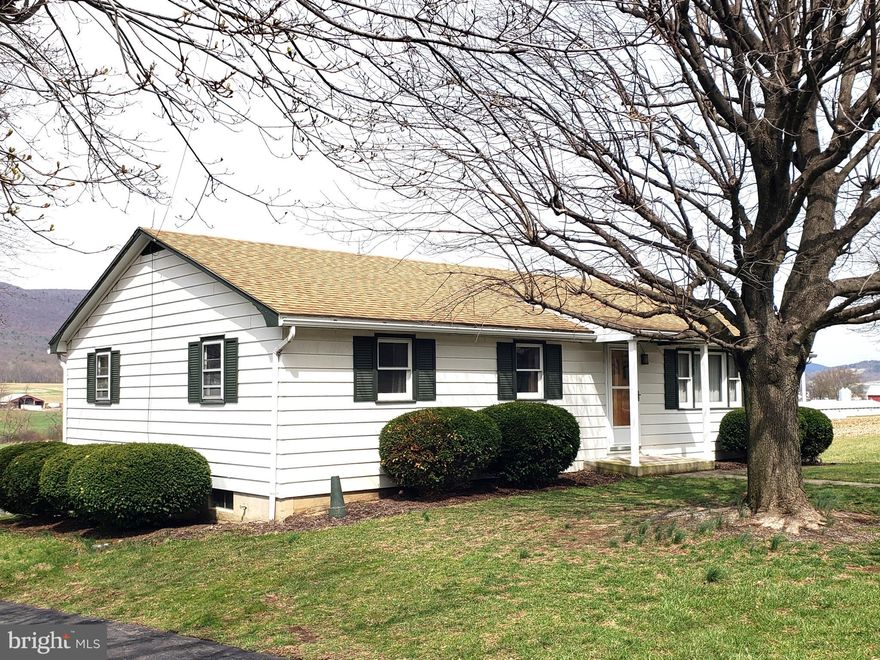 Check out the views! This rural 3 bedroom 1 bath home on .43 acres with 2 integral garage spaces is waiting for you to make it yours. The main floor consists of a sizable living room, an extra large kitchen which currently also includes the laundry with washer and dryer included, a full bath with a tub/shower, and three bedrooms. The lower level offers 2 integral garage spaces, along with ample room for a workshop, storage, and the laundry area if you wish to move it out of the kitchen. Newer 200 amp electric service, Rudd water heater, and roof installed in 2018.  Heat is currently electric baseboard. Private on lot septic and well. 20 minutes with way to Selinsgrove or Mifflintown with access to Rt 322. The rural  countryside is dotted with small businesses that provide unique products and services. Check it out and make it yours today!