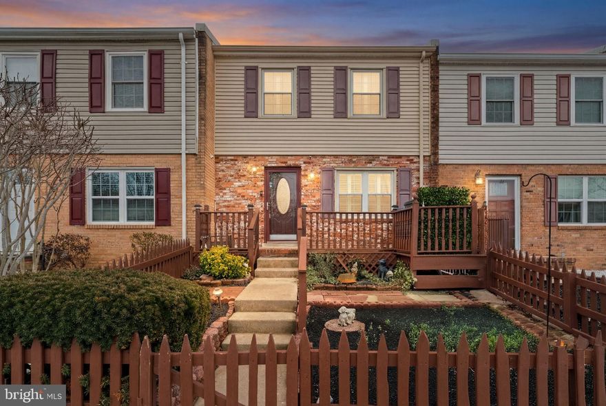 Welcome to this charming 2-bedroom, 1.5-bath townhome offering three levels of finished living space. Enjoy relaxing on the expansive front porch, perfect for unwinding and taking in the outdoors. The updated kitchen features granite countertops, stainless steel appliances, and elegant white cabinetry and custom blinds throughout the house.  Upstairs, you’ll find two spacious bedrooms with ample closet space and a full bathroom. The fully finished basement provides flexible living options—ideal for a recreation room, possible third bedroom, or home gym.  Step out the back door into a workshop that leads to a fenced-in backyard, offering even more space for hobbies, storage, or outdoor enjoyment. The possibilities are endless.  Conveniently located close to shopping, restaurants, commuter lots, and easy access to I-95.