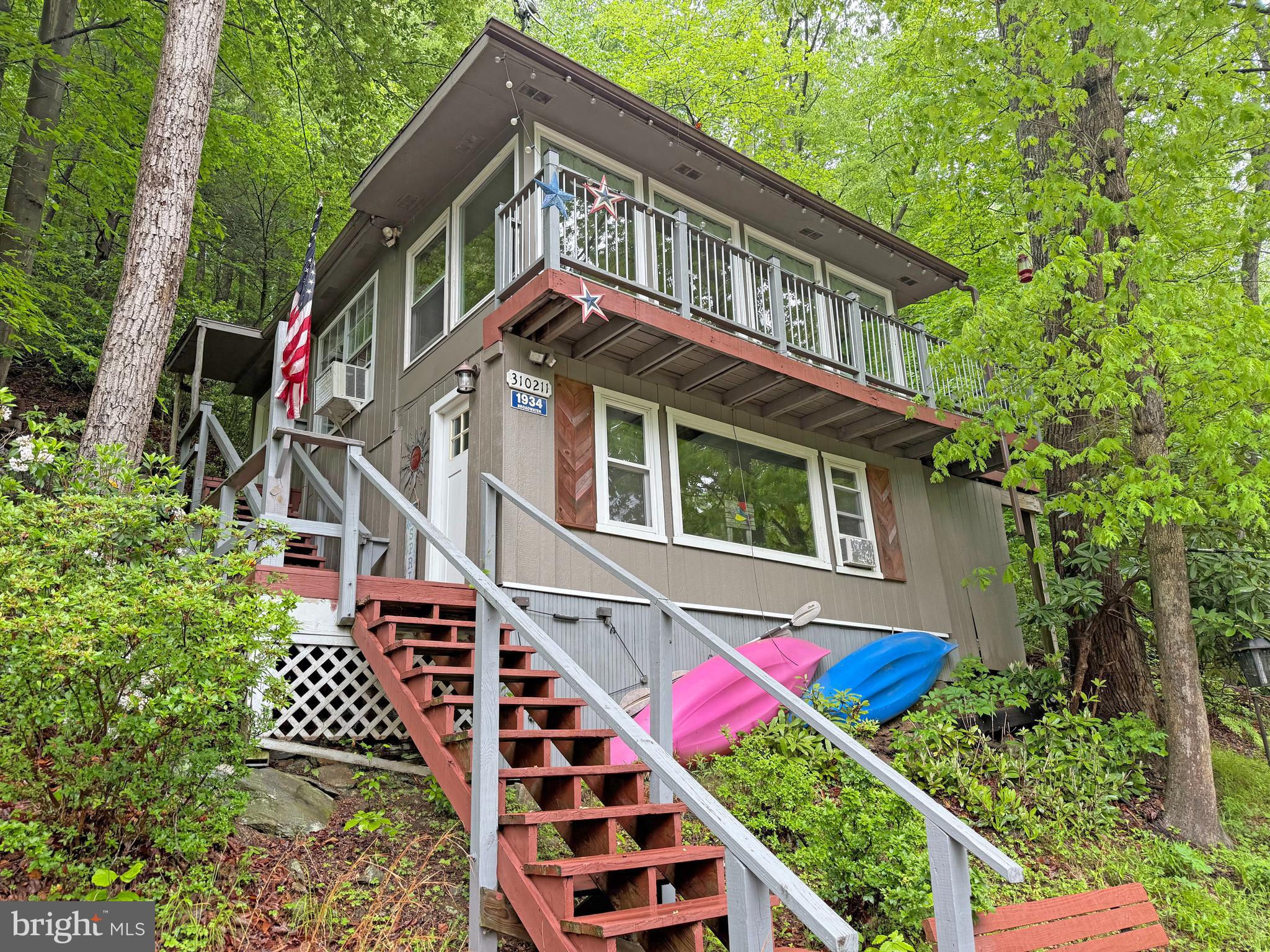 RARE OPPORTUNITY to own the most charming cottage on Broad Creek! This home has the most desirable views and sits in a very tranquil and serene setting at the end of the creek.
1934 Auer Lane offers a cozy family room, dining area with floor to ceiling windows. 2 Bedrooms on the main floor and wake up in the lower level Primary bedroom that boasts an extra large picture window.
A MUST SEE TO REALLY GET THE FEEL! FAMILY FUN AWAITS with grilling, fishing, smores by the camp fire, paddle boards, kayaks, jet ski’, Pontoon boating!
This is a LAND LEASE held by EXELON and can NOT be financed. A CASH ONLY SALE is subject to the NEW BUYERS application and approval by CONSTELLATION ENERGY.
The annual land lease TAX ASSESSMENT is based on the 2024 numbers.
You are not buying the land. Seasonal use, only. Cannot be used as a permanent residence