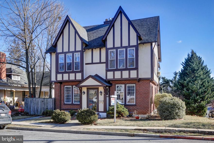 Charming Tudor style home in the heart of Hagerstown! This 4 Bedroom 2 Full Bath home boasts a total of 2600+ Sq. Ft. of Living space on two fully finished levels, as well as a partially improved basement and fully floored attic ready to add even more living space- think HOME OFFICE/SCHOOL! The old world charm includes hardwood flooring, brick gas fireplace, exposed beam ceilings, and formal dining room. Upgraded Gourmet Kitchen with granite countertops, stainless appliances, gas cooking, and built-in microwave. Sunroom with built in theater capabilities. Lower level has laundry and a partially improved Recreation Room. Large rear patio with firepit, attached carport and off street parking.