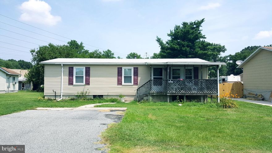 Lovely 3 bedroom home with an additional 1/5 acre lot included in the sale! Gain extra land or have a family member build at a great value! 25 year roof replaced in April 2018. 1 car detached garage. Unfinished basement.  Nice sized bedrooms. Large bathroom. Open dining room into kitchen.  Front and back porches. Quiet street.