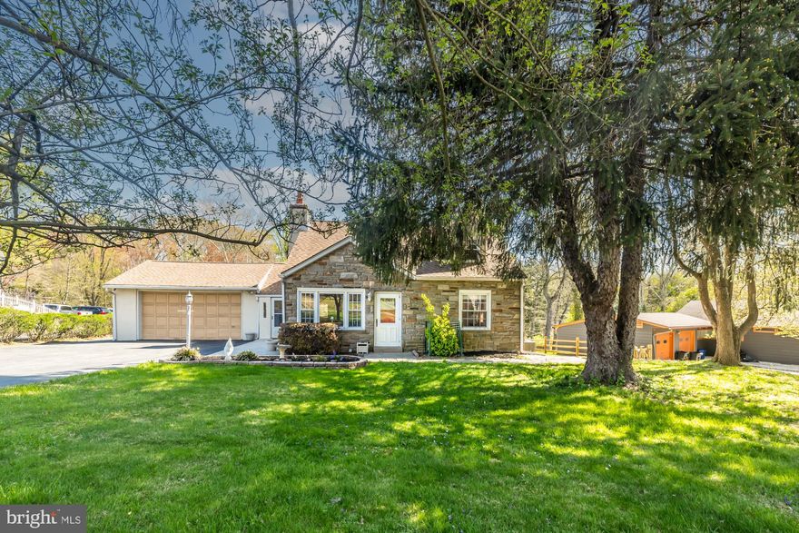 Tucked away on a rare 1.10-acre lot in desirable Springfield, this charming Cape Cod style, single-family home offers the perfect blend of privacy, space, and classic character. Set back from the road, 405 provides a peaceful retreat while still being conveniently located near the middle of town Springfield and shopping along The Golden Mile. This thoughtfully expanded Cape Cod–style home features a spacious and versatile layout, including a sought-after first-floor primary suite complete with a private bath boasting a soaking tub and separate stall shower, ideal for comfort and convenience. In addition, the 4th bedroom is also right next to the Master, which would make a great nursery, closet or small office or bedroom. Inside, you’ll find beautiful hardwood flooring throughout most of the first floor and all of the 2nd, that adds warmth and timeless appeal throughout the main living spaces. The addition enhances both functionality and flow, creating plenty of room for everyday living and entertaining inside and out. 
Step outside to enjoy the expansive rear deck, perfect for gatherings or quiet evenings, complete with a dedicated gas line for your grill, making outdoor cooking effortless year-round. The generous lot offers endless possibilities for recreation, gardening, or simply enjoying the serene surroundings.
Lastly, the two-car garage is perfect for any car enthusiast or anyone who is seeking to keep cars out of the elements. Complete with Anchor Pots and a natural gas heater, it makes for a multi-use space to fit most owner’s needs.  Don’t miss a rare opportunity to own a private, spacious property in Springfield with classic charm and modern comforts…this home truly has it all.