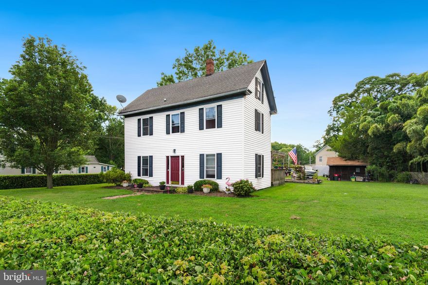 Welcome to 5936 North Main Street. This home is situated on a corner lot on Main Street in Rock Hall, providing convenient access to all the amenities and attractions the area has to offer, including shops, restaurants, a public beach, boat ramps, and marinas. This colonial style home offers comfortable living with a main level bedroom, making it ideal for those seeking single level living or flexible use of space. The family room with a pellet stove provides a cozy atmosphere during colder months. The kitchen is designed with functionality in mind, featuring ample counter space, a gas range for cooking enthusiasts, and elegant bamboo floors. The back deck with doors from the kitchen allows for easy outdoor dining and relaxation. Upstairs, you'll find two large guest bedrooms, each equipped with new carpeting for comfort and style. The full bathroom on the upper level caters to the needs of family members or guests. The crawlspace is conditioned with a professional vapor barrier and closed cell foam. Kitchen was recently re-plumbed and has all new wiring. The backyard is a perfect place for hosting gatherings with its deck featuring a charming pergola and a paver patio. Additionally, the property comes with two sheds, providing ample storage space for all your belongings. Don't miss out on the opportunity to own this charming colonial home in Rock Hall, offering both comfortable living and easy access to the town's amenities. Schedule a showing today and make this house your home!