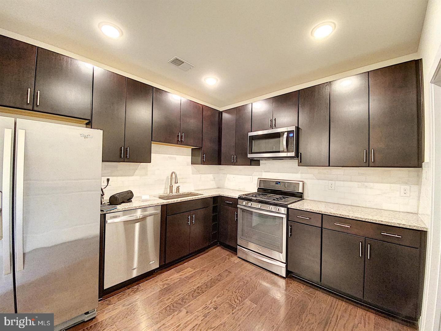 Beautiful 2-Bed, 2-Bath Condo in Prime Vienna Location!
Step into this stunning, light-filled condo just moments from the Vienna/Fairfax Metro Station! Boasting an open floor plan with spacious living and dining areas, this home is perfect for both relaxing and entertaining. The gourmet kitchen impresses with granite countertops, a convenient breakfast bar, rich maple cabinetry, stainless steel appliances, and elegant hardwood flooring.
The primary suite offers a walk-in closet and a luxurious en-suite bath, while the private balcony provides a peaceful retreat with lovely neighborhood views. This secure, fob-access building includes elevator access and comes with two assigned underground garage parking spaces plus additional outdoor guest parking.
Residents enjoy access to the Providence Community Center, featuring a gym, fitness center, game room, and more.
With quick access to Routes 29, I-495, and I-66, this is a commuter’s dream!