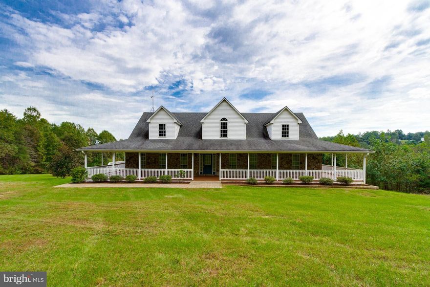 Beautiful home in a private setting!  This 4 BR/4BA home offers a main level master bedroom with private bathroom, formal dining room and large family which adjoins the large open kitchen.  Walkout basement is partially finished. The outdoor privacy can be enjoyed while sitting on the wrap around porch.  This property is an outdoor enthusiast dream that offers a large yard, great views and a pond.