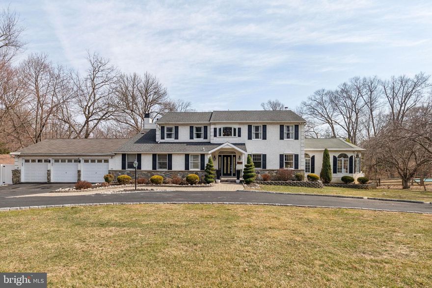 Welcome to the home of your dreams! Situated in the highly desirable Broomall area, this exceptional property features 5 bedrooms, 4.5 baths, a finished lower level, extensive outdoor living space, and a 3-car garage.

Entering through the foyer, you’re greeted by marble-inlay floors and soaring ceilings, accented by a striking modern chandelier. Just off the foyer to the left, there is a convenient large coat closet and powder room. To the right off the foyer, the formal dining room is bathed in natural light from expansive front windows. Continuing through, the impressive great room boasts vaulted ceilings, oversized windows, and a skylight. A private office, enclosed by elegant glass doors, connects seamlessly to both the dining and great rooms.

Straight through the foyer, the eat-in kitchen is a chef’s dream, outfitted with stainless steel appliances, a massive island with waterfall quartz countertops, and ample custom cabinetry for all your storage needs. The breakfast bar is ideal for a quick bite or morning coffee. The kitchen flows effortlessly into the family room, where multiple skylights flood the space with natural light, and a back door opens onto the expansive deck and backyard.

Stepping down from the kitchen, the formal living room offers a cozy gas fireplace, creating a warm and inviting atmosphere. Off this space, a hallway leads to the main-floor bedroom with an ensuite bath, a well-appointed laundry room featuring cubbies & a dog wash station (which doubles as a mop sink), and indoor access to the 3-car garage. 

Upstairs, the primary suite is a true retreat. The generously sized bedroom boasts a gas fireplace and an oversized walk-in closet with custom shelving. The ensuite bathroom features a double vanity with ample storage, a walk-in shower, and a luxurious jacuzzi tub. Two additional well-sized bedrooms share a hallway bathroom with a newly re-glazed tub/shower combo and a double vanity.

Downstairs, the finished basement is outfitted with brand-new carpeting and offers a spacious living area, perfect for entertaining or unwinding. A separate bedroom with an adjacent full bathroom makes an ideal au pair or in-law suite. Across the hall, a large walk-in closet provides extra storage. This level also includes walkout access to a small patio area below the deck. On the other side of the basement, a full gym with extensive closet space and a gas fireplace could easily be converted into another bedroom.  

Outside, there is plenty of space to enjoy! The rear of the home features a large deck that extends to a screened-in gazebo with built-in seating—perfect for entertaining. The expansive backyard includes a playground, lush green space, and a brick patio with a fire pit and seating area. Steps lead up toward the house, providing access to the basement, family room, and garage.

This incredible home has it all—schedule your showing today!