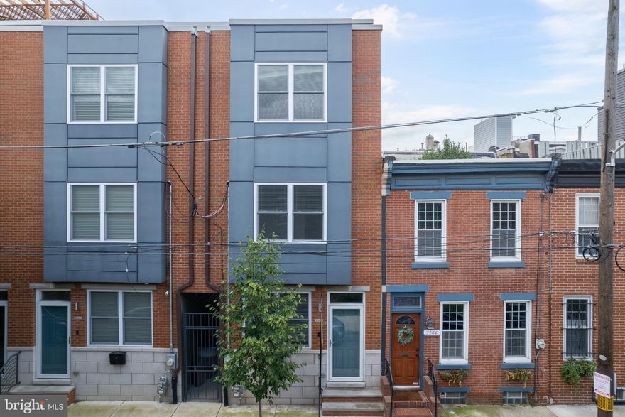 Location, location, location! 2142 Kater St has it all. Beauty, space and location! Just south of South St on one of the best tree lined streets in Graduate Hospital, this 4 bedroom, 2.5 bathroom home with rooftop views for days is waiting for it's new owners. Located in the Greenfield Catchment, this home was built in 2020,  but it feels like it was built yesterday, it's been lovingly maintained over the past few years. And the best part is that there are approximately 6 years left on the tax abatement, saving you $9,000 / year for the next 6 years! City living could not be easier in this home. Walk out of your front door and within 2 blocks you have a CVS, Wawa, Starbucks, Amazon Hub, dry cleaner, restaurants and 2 grocery stores! Walk a little further and everything in Rittenhouse Square is at your fingertips.   It has been beautifully maintained by the owners and shows perfectly. The first floor is a traditional Philadelphia style row home with the living room, dining room and kitchen all open and flowing into one another. Warm and rich colored hardwood floors welcome you and are throughout the rest of the home. The kitchen has an upgraded counter-depth refrigerator, slide in range, and wide sink along with the most beautiful granite countertops. Open shelving along the one side provide the perfect place to display all of your cookbooks, plants and fancy dishes. A back patio off of the kitchen is a great spot for your grill or container garden. Before you head upstairs, be sure to open the front door. If you have not noticed, a glass exterior door floods the living room with light and allows for such a wonderful connection between the home and the outside. It’s really a special feature not found in most Philly homes. On the second floor are 2 bedrooms with a shared hall bathroom. There is also a proper laundry room with side by side washer/dryer, cabinetry and a utility sink. You may not actually mind doing laundry in this house! The third floor is the entire primary suite. The owners bedroom is spacious and has city skyline views and a tray ceiling. The bathroom has a large double vanity with a tiled shower and a private toilet room. The oversized walk in closet with custom built ins will not disappoint! There is a full roof deck with some of the best skyline views. You can see 3 - 4 different fireworks shows from up there during the holidays. The basement is fully finished with multiple storage closets and a powder room. This space can be used the 4th bedroom. Other notable features are dimmable lights, central vacuum, dual zone HVAC, security system and about 6 years left on the tax abatement! If you are thinking about schools, this house is in the Greenfield Catchment! Come see this beautiful  home on one of Graduate Hospitals best blocks!