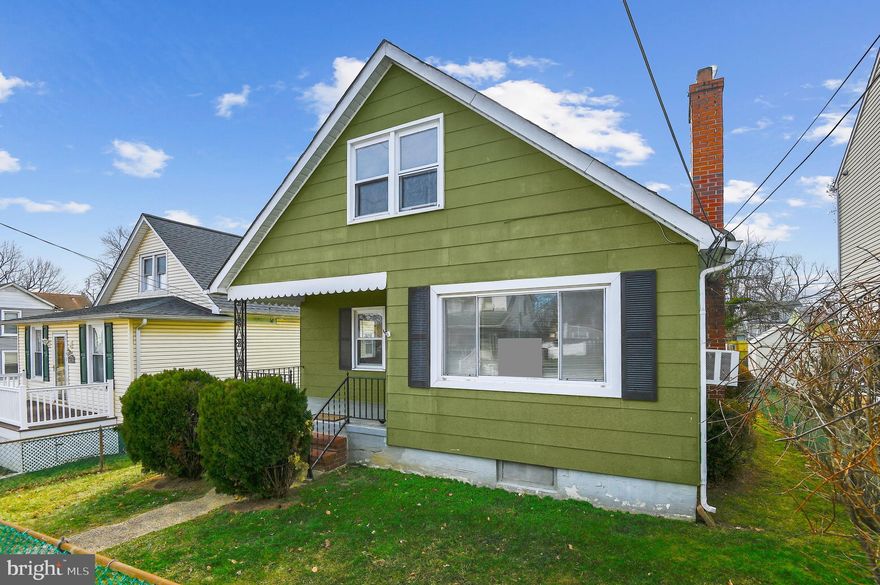 You have another chance! Buyer's financing fell through. Darling home ready for you to personalize - a bit of paint and this home will glow! Photos have been updated to better represent the true olive green color of the house. The seller has cared for this home for 50+ years, and it really shows. Nice living room with hardwood floors and fireplace, leading to a bedroom and full bath on the left, country kitchen behind. Two good sized bedrooms upstairs, with storage in the eaves. Then the basement is the full footprint of the house, ready to be finished any way you like. Quiet street with GREAT neighbors, a few blocks from the Light Rail and the park. FHA/VA/MMP - cooktop and oven work, but there is peeling paint in the mudroom. Selling AS IS - Seller will make no repairs, but could be amenable to the buyer making repairs with the right offer.