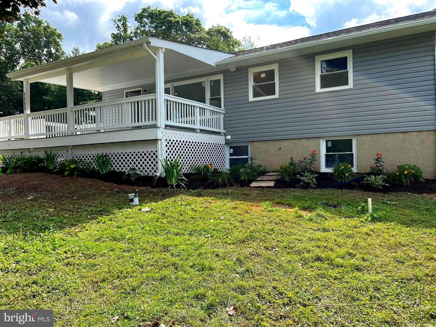 Wow! Fully remodeled home with everything on your wish list. Beautiful brand new white kitchen cabinets with quartz countertop, and new stainless steel appliances. Enjoy your morning coffee on your covered front deck or on your large stone rear patio. Plenty of parking on your quiet, peaceful street, home has large yard for gardening and kids to play, great schools too! Two story shed in the rear of your 3/4 fenced yard. Sunny open floor plan, comes with Brand new roof, windows, HVAC, brand new flooring, and paint. All new bathrooms. all new plumbing and electric, new siding, brand new asphalt driveway. All new water system including well pump, holding tank, and water heater. Final touches includes the fully finished spacious basement with fireplace and separate entrance. Over 1700 square feet of beautiful living space. Basically a brand new home but at an affordable price, with everything done by permits and under warranty. Nothing to do but move in and enjoy!