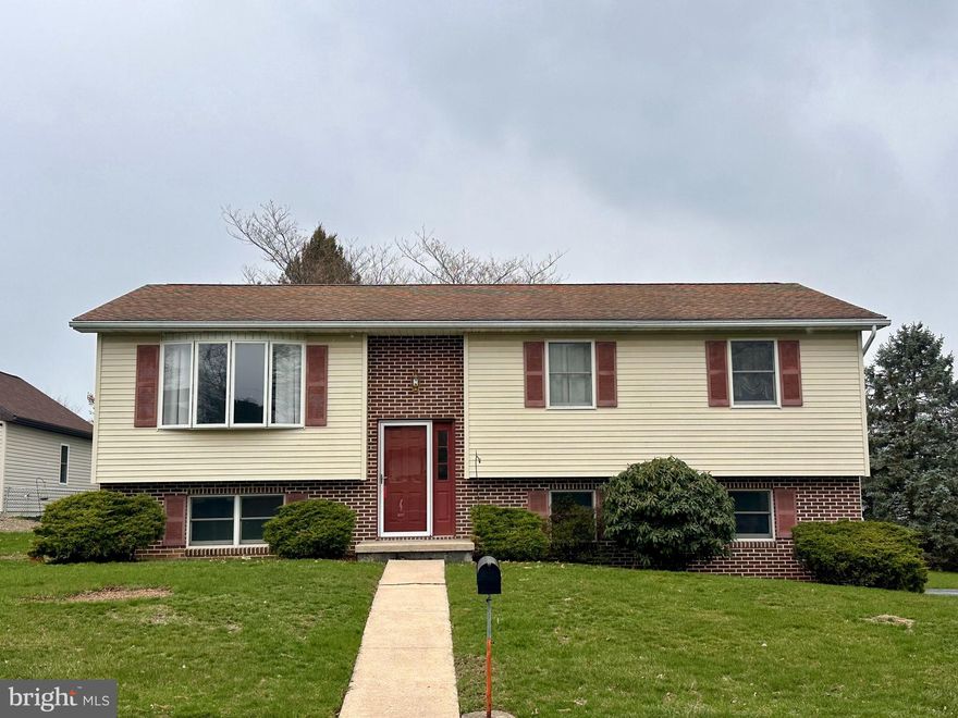 Welcome to this spacious traditional bi-level home located in Cornwall-Lebanon School District. Offering over 2,400 total square feet, this home provides comfort, functionality, and room to grow.

The upper level features a generous living room filled with natural light and anchored by a cozy electric fireplace—perfect for relaxing or entertaining. The open-concept kitchen and dining area flow seamlessly together, with sliding glass doors that lead to a low-maintenance Trex deck and a large backyard —ideal for outdoor dining and enjoying the large backyard. Three bedrooms with closets, full bathroom and a half bathrooms in master bedroom. 

The lower level includes a partially finished basement with half bathroom, providing versatile space for a home office, gym or additional living area. Attached two-car garage and a convenient laundry area complete the lower level.

Additional features include electric heat, central air conditioning, and a fantastic location close to schools, parks, restaurants and local amenities. Don’t miss the opportunity to make this wonderful property your  home!