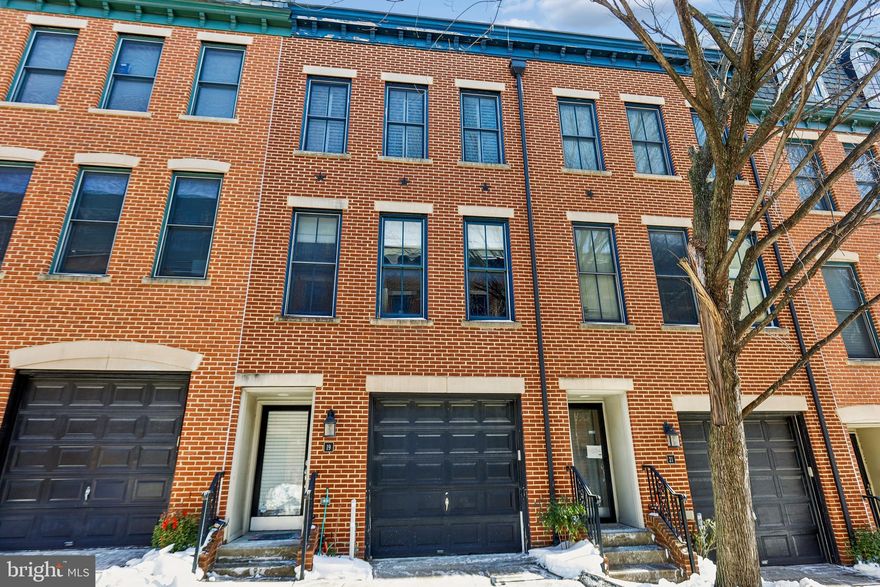Welcome to 19 S Regester Street, a refined city residence designed for buyers who want space, privacy, and elevated outdoor living—without giving up walkability or convenience.

With over 2,100 square feet, this home lives larger than expected, offering a layout that adapts to real life: entertaining, working from home, hosting guests, or simply having room to breathe. The open main level is warm and inviting, filled with natural light and anchored by hardwood floors and a well-appointed kitchen with granite countertops and generous storage—the kind of space that makes daily routines feel effortless.

The loft level sets this home apart. It offers flexibility for a private retreat, executive home office, or creative studio, and opens to two private balconies with gorgeous views—a rare feature that creates a sense of calm, privacy, and escape above the city. Morning coffee, evening wine, or quiet reflection all feel intentional here.

Each bedroom includes access to its own bathroom, removing friction for guests or shared living, while the two-car attached garage eliminates a major urban pain point and adds everyday convenience and security.

Set in Washington Hill, moments from Fells Point, Patterson Park, Johns Hopkins, and the waterfront, this location supports both lifestyle and long-term value. This is a home that quietly checks every box—and a few most buyers don’t realize they want until they see them.
