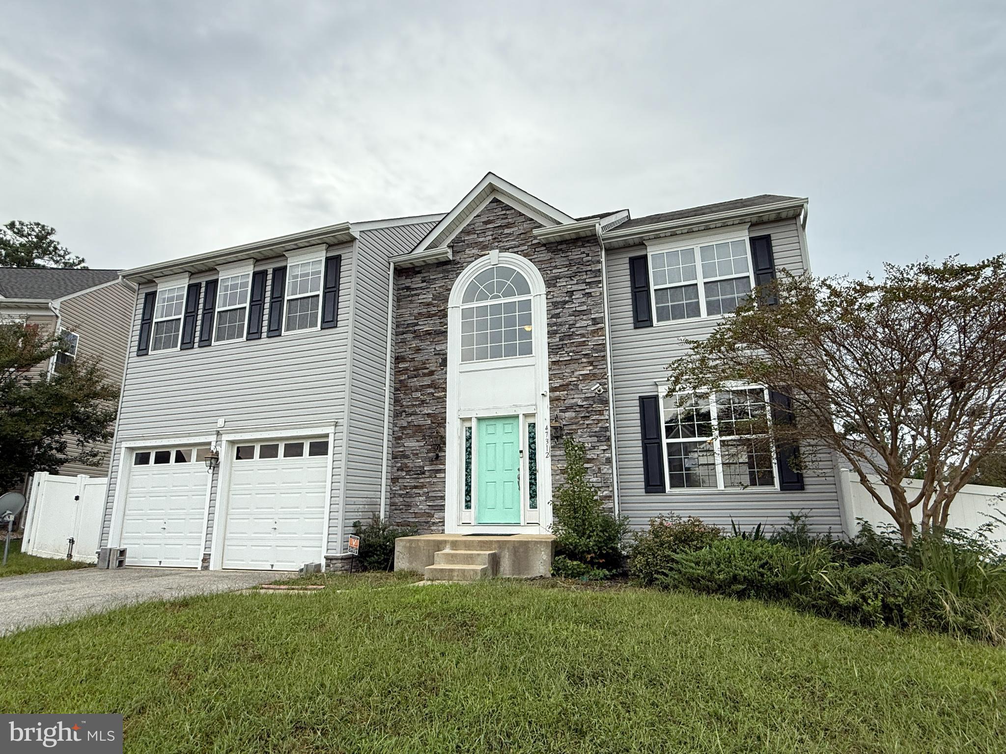 This spacious 4-bedroom, 2.5-bath colonial offers a traditional layout with plenty of room to grow. The main level features a formal living room and dining room, along with a fully-equipped kitchen that opens to the breakfast nook and family room. A convenient laundry room, powder room, and access to the 2-car garage complete the first floor. Upstairs, the large owner’s suite includes a private bath with a soaking tub, accompanied by three additional bedrooms. The expansive unfinished basement with a three-piece rough-in for a full bath provides excellent potential for additional living or recreation space. Outside, the fenced backyard is ideal for gatherings, play, or pets. While the property would benefit from some updates, it offers a wonderful opportunity to customize a home to your taste and style. Ideally located near NAS Patuxent River, this home also provides easy access to shopping, dining, schools, churches, and recreational activities. Local highlights include Point Lookout, Saint Mary’s City, Leonardtown, and Solomons Island, just to name a few. Call today to schedule your showing and explore the potential to make this home YOURS!