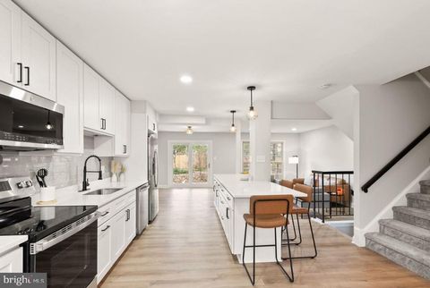 Photo of 5404 Charleston Woods Drive, FAIRFAX, VA 22032 (MLS # VAFX2312184)