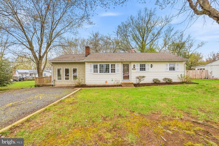 Adorable rancher on Kent Island in the community of Harbor View! Featuring 3 beds, 2 baths, and private driveway. Enjoy the large fenced yard with deck, shed, and firepit. The living room has a cozy fireplace with wood stove insert. The primary bedroom has a private bath with tile and stand up shower. Updates include both bathrooms, updated windows, roof 2020. Close to Route 50 for easy access to the beaches or the Bay Bridge, trails, medical, restaurants, and shopping.