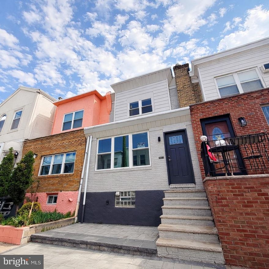 Welcome to this fully renovated gem at 3013 South Carlile Street. Renovated in 2025, this stunning 2 bedroom, 1.5 bath home blends modern style with everyday comfort, featuring all new electrical throughout and efficient baseboard radiator heat. Every detail has been thoughtfully updated to create a bright, fresh, and truly move in ready space. The home offers rare off street parking, a half finished basement ideal for additional living space, a home office, or extra storage, and a convenient stacked washer and dryer. Out front, beautiful pavers enhance curb appeal, while the private back deck provides a standout feature with open views toward Broad Street and the unique ability to enjoy city celebrations, parades, and major events right from your own home. Perfectly situated on a quiet no outlet street, this property offers an added sense of privacy, safety, and peace of mind, all within a stable and well established community setting. The location truly cannot be beat, with close proximity to public transportation including subways and buses, as well as quick access to I-76 and I-95 for effortless commuting. Highly motivated to sell. This turn key home presents an exceptional opportunity for buyers to secure a stylish and rare city property without delay.