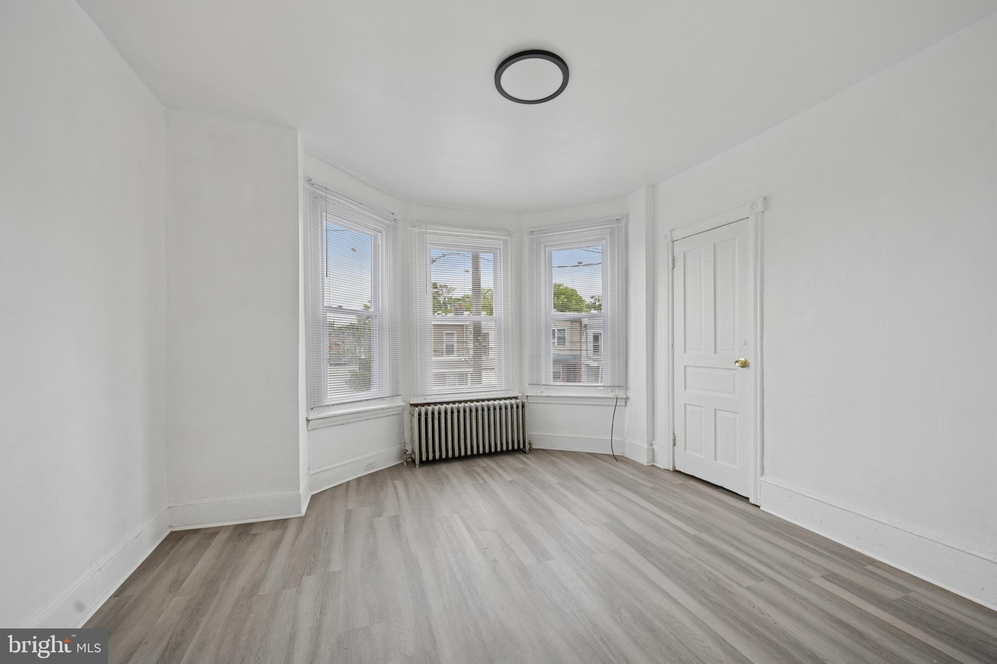 Welcome Home! Step into your new space in the heart of Cobbs Creek section of Philadelphia. This apartment is a walk up to the second floor, offering convenience and comfort. As you enter the building, you are greeted by a spacious foyer filled with natural light leading upstairs to the hallway. Two spacious bedrooms sit on opposite sides of the unit to enhance privacy creating an inviting living space, perfect for working professionals and small families. The kitchen has been freshly updated with a new backsplash, cabinets, refrigerator and stove with enough space for a dining table with chairs. The bathroom has a new vanity with white appliances. Don't miss this chance to make this lovely apartment yours before it's too late. Schedule a showing today and experience the charm of Philly living.