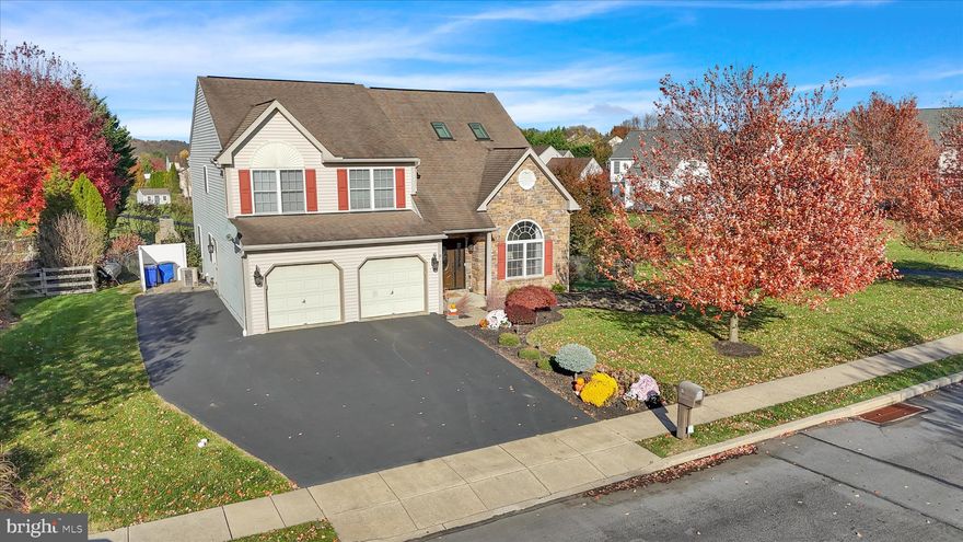 Bring in you offer!! Quick settlement possible....Built in 2006....One of the best homes and locations in the Green Valley Estates.  This 4 bedroom, 3 1/2 bath, 4168 sf property in Wilson School District features custom maple cabinets, quartz countertops, wine cooler & dry bar, dishwasher, double wall oven, microwave & Thermador stove top. Corner pantry and pendant lighting, beautifully covered deck just off kitchen, the den next to the kitchen has a stone gas fireplace, the living room has hardwood flooring and a double wide window with 1/2 circle top, adjacent to the LR is a well sized dining room with recessed lighting and highlighted by crown moulding & pillars. The 2nd floor features an open loft area that is great for an Office/Library/Lounge with recessed lighting. The master bedroom includes cathedral ceiling and ceiling fan, walk-in closet, & large private bath with double vanity sinks, skylight, stall shower and soaking Jacuzzi tub, 3 nicely sized bedrooms and a hall full bathroom to complete the 2nd floor. The fully finished basement includes a bar with custom counter, an exercise room/billiard room and a TV/Media room and another full bath, also an additional area for storage. This home is located on a beautifully manicured lot with a recently upgraded($100,000) professionally landscaped including an outdoor fireplace(a must see!) and overlooks open space. Seller is offering a Cinch Home Warranty a $593 Value. Call today!