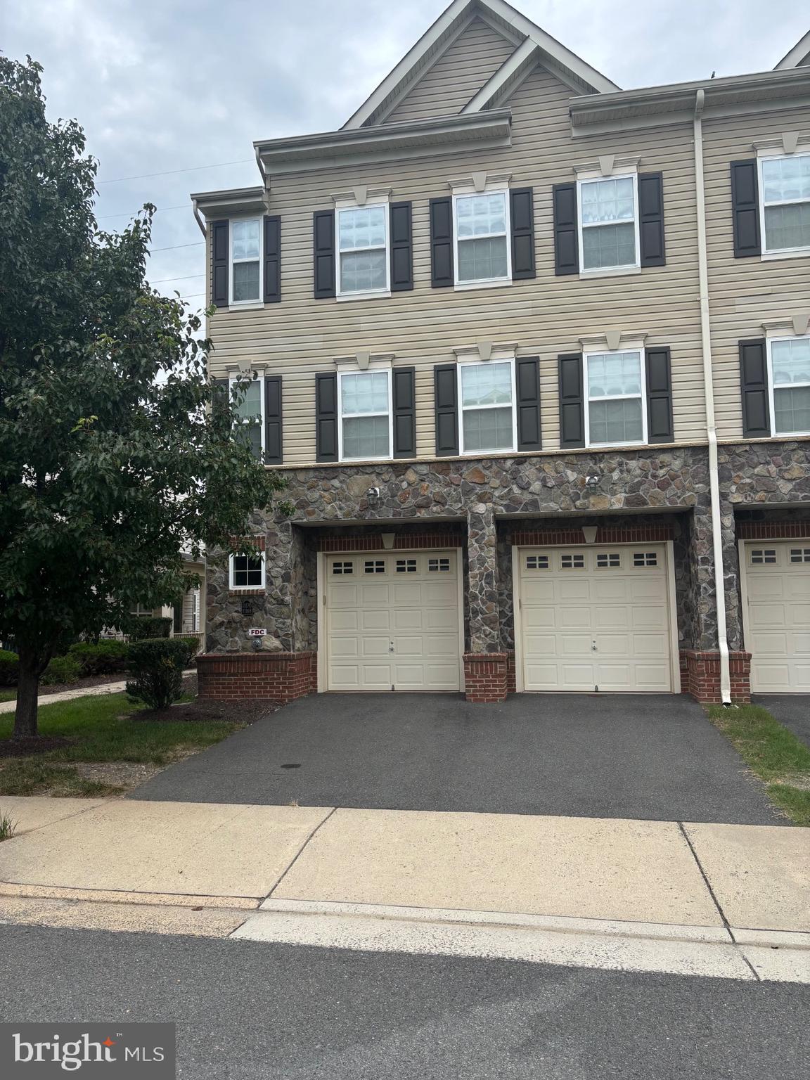 Great opportunity to rent a well-maintained 3-bedroom, 2.5-bath townhome. This spacious three-level unit features a Prime Location: Conveniently located near Sudley Road and I-66, just minutes from Costco, One LIFE and many other shopping and recreational amenities. Open Concept Kitchen/Dining Room: Perfect for entertaining, with modern finishes and an abundance of storage. Affordable living in a desirable community. 1-Car Garage: Secure parking with extra storage space. Tile, Hardwood and Carpet Flooring: Stylish and practical throughout. Spacious Bedrooms: Large master suite with an even larger closet, plus two additional bedrooms that are more spacious than most townhomes. Reach out for more details or to schedule a viewing. This UNIT will not last for long....!