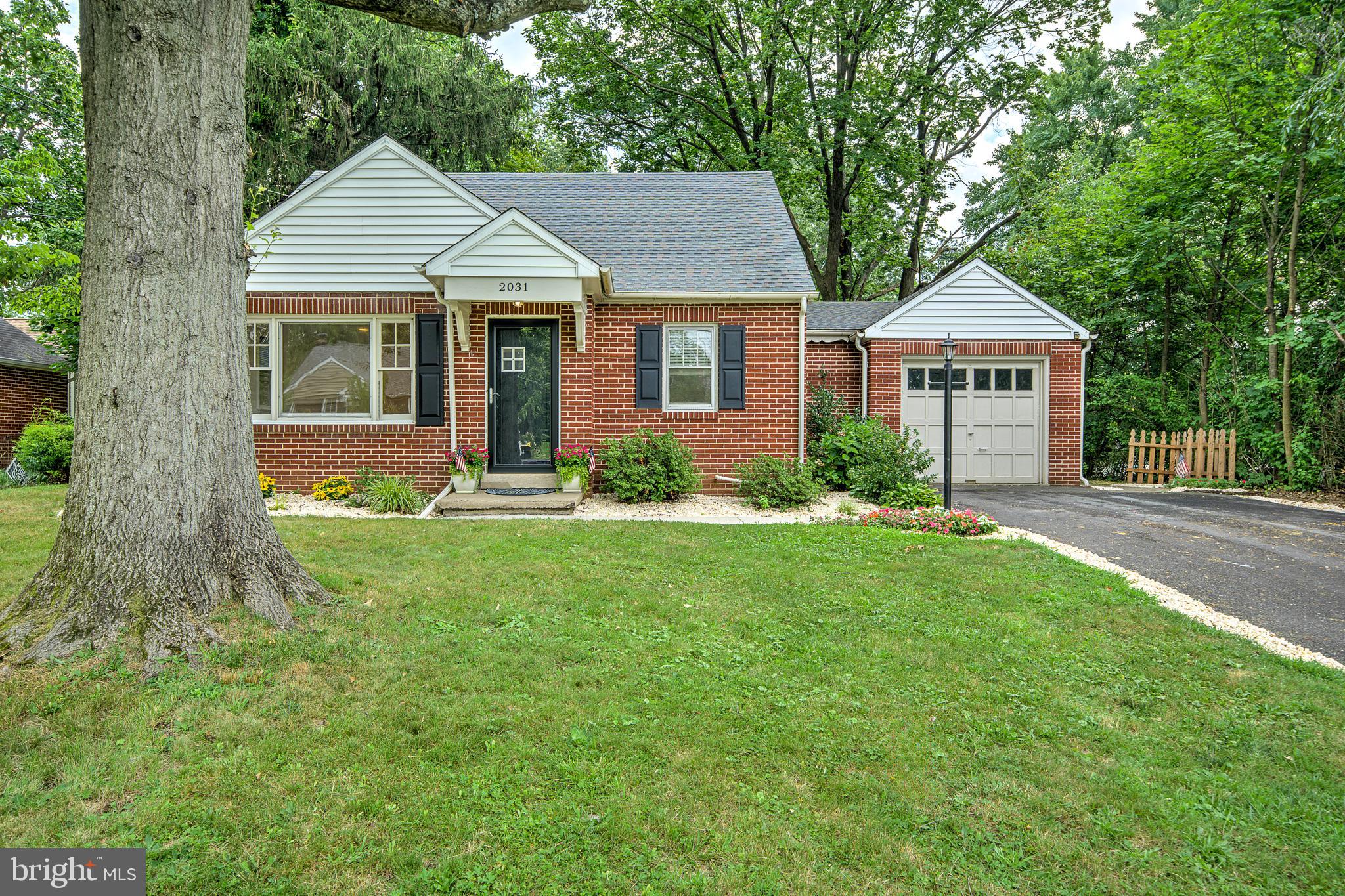 Welcome to your dream home at 2031 Oak Road, located in the desirable North Penn School District! Nestled in the serene community of Hatfield, this delightful residence perfectly blends old-world charm with modern sophistication, offering a warm and welcoming atmosphere. This enchanting 4-bedroom, 2-full bathroom home spans 1553 square feet and is set on an expansive .46 acre lot, offering abundant space for leisure and entertainment.
Step inside to find a welcoming mix of classic style and modern updates. The freshly painted interior flows seamlessly from room to room, featuring original hardwood floors, arched doorways, and decorative molding that add character and warmth. For convenience, two bedrooms and one of the full bathrooms are located on the main floor. While the other two bedrooms and another full bathroom is located on the second floor. The home also features an expansive eat-in kitchen, complete with a tile backsplash, beautiful cabinets, newer countertops, and modern appliances, making it a delight for any culinary enthusiast.
At the heart of the home, an updated enclosed heated porch offers the perfect spot for enjoying tranquil evenings or morning coffee, surrounded by nature's beauty. New carpeting in this space adds an extra layer of comfort, while sunlight streams through brand-new windows, filling the living area with a bright and airy feel.
Attention to detail is evident throughout the home, with a new roof, all-new door hardware enhancing both functionality and style, while the original charming front door and hardware remains intact, preserving a touch of its classic allure. Recessed lighting beautifully illuminates the spaces. The home is an energy efficient home that features Cellulose insulation which was installed in 2009, updated heating system along with a separate central air conditioning system for year-round comfort, complemented by completely updated plumbing and electrical systems, including a replaced electric panel, ensuring peace of mind.
Discover the versatile basement area, offering ample storage or potential for additional living space.
Outside, a vast, private backyard awaits your imagination—ideal for garden parties, play, or simply unwinding in serene solitude. Experience the perfect blend of history and modernity at 2031 Oak Road, where every detail has been meticulously curated for your comfort and enjoyment.