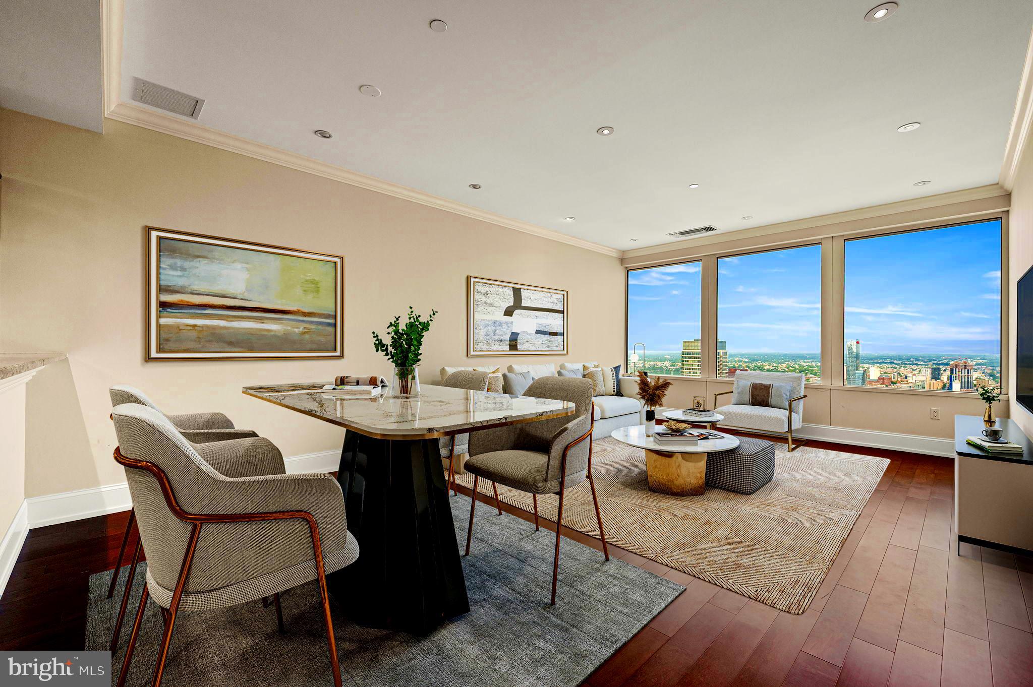 Experience elevated living at Two Liberty Place, one of Philadelphia’s most iconic addresses where world-class design meets unmatched skyline views in the heart of Center City. Arguably the best in town, this stunning residence offers a refined blend of modern luxury and timeless elegance, featuring expansive windows, tall ceilings, and amazing views of the city, the Schuylkill River, and beyond. Inside, you'll find a spacious open-concept layout with top-tier finishes throughout—including hardwood floors, a chef’s kitchen with Sub-Zero and Miele appliances, sleek cabinetry, and luxurious stone countertops. The primary suite offers a serene retreat with stellar views and a spa-inspired bath complete with a frameless glass shower and soaking tub.
Residents of Two Liberty enjoy white-glove amenities, including a 24-hour concierge and doorman known for their exceptional service, chauffeur-driven car service, state-of-the-art fitness center and yoga studio, massage room, sauna, endless pool, a beautifully renovated resident lounge, and a fully equipped business center with two conference rooms. The amenity floor recently completed a $2.5M renovation that is a must-see. Residents also enjoy direct indoor access to The Shops at Liberty Place.
Step outside and you're within walking distance to Rittenhouse Square, the Avenue of the Arts, City Hall, public transit, top restaurants, luxury boutiques, and everything Center City has to offer. Whether you're seeking a full-time residence or a sophisticated pied-Ã -terre, this is urban living at its finest. Schedule your private showing today and discover why life at Two Liberty is truly above it all.