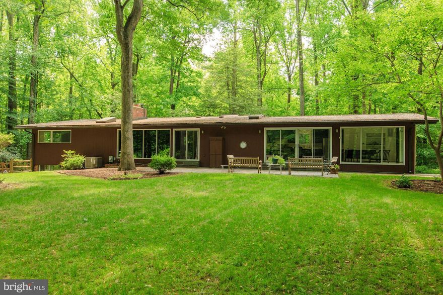 PICTURESQUE PARADISE ON OVER AN ACRE IS THE SETTING FOR THIS SPACIOUS LIGHT FILLED 4 BRM 3 BATH CONTEMPORARY!  WIDE 2-STORY FOYER OPENS TO GRACIOUS LIVING RM & FP,  DEN WITH PATIO & GLORIOUS VIEWS. KITCHEN WITH ISLAND & BREAKFAST RM JOINS FAMILY RM,  ALL OVERLOOKING LUSH GREENERY.  SPACIOUS BRIGHT MASTER BEDROOM & BATH, 3 ADD'L FAMILY BEDROOMS. GORGEOUS POOL .