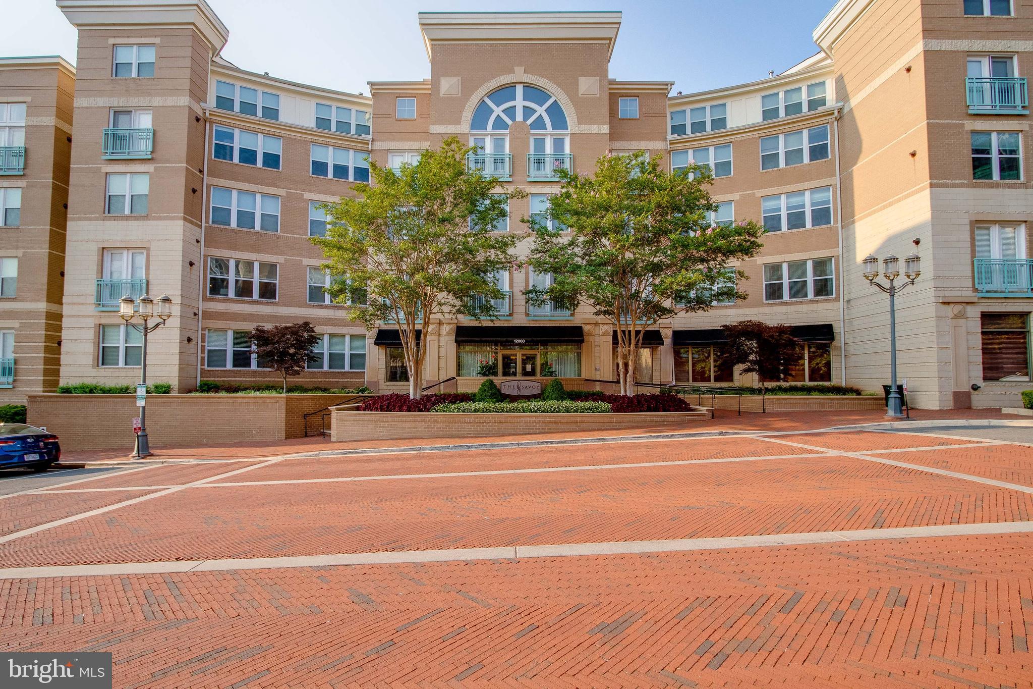 Live in the heart of Reston Town Center for just $2,150/month! This bright and spacious 1BD/1BA condo features hardwood floors, recessed lighting, a large bathroom, walk-in closet, and in-unit washer/dryer. The kitchen boasts all-new appliances (2023), and the unit includes reserved garage parking (GL113), just steps from the elevator.
Enjoy direct access to a peaceful garden, walking paths, picnic areas, and the pool. The Savoy offers top-notch amenities: outdoor pool, gym, party rooms, billiards, concierge, and secure FOB entry. Walk to shops, dining, entertainment, bus stops, and the new RTC Metro. Don't miss this rare opportunity! The unit will be available in the beginning of October.