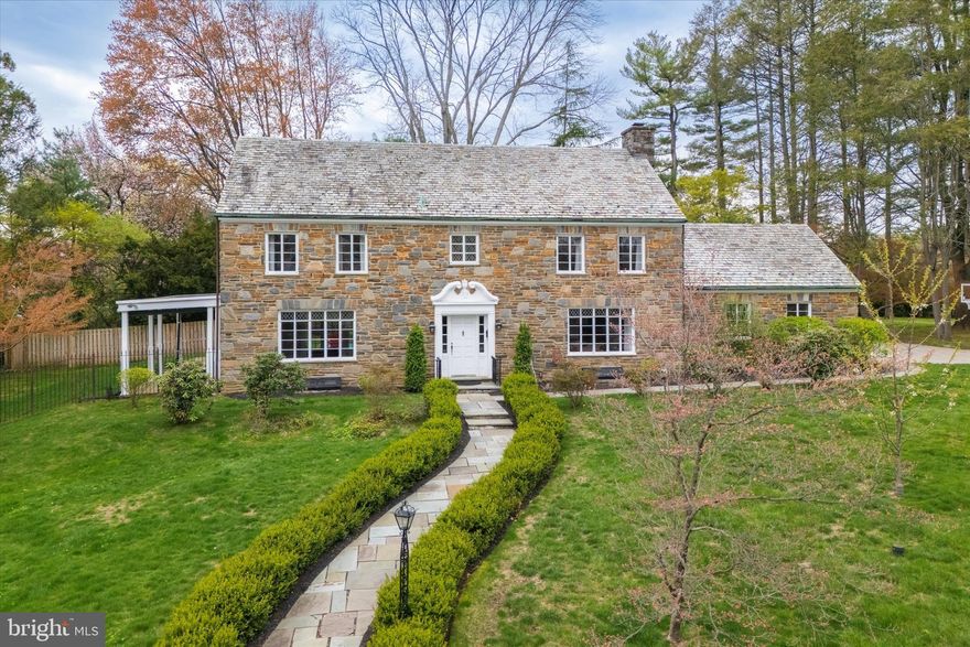 Make this classic center hall colonial your next home and you will never have to move again. 110 Raynham has everything today's discriminating buyer is looking for and more. A traditional Main Line home with all the modern updates that add comfort and convenience to your everyday lifestyle. A true oasis awaits after you when you walk up this welcoming flagstone walkway to the stately front door with colonial moldings and side transom windows. Enter the graciously appointed central foyer with its handsome turned staircase and beautiful hardwood floors. This centralized room unfolds the residence to a wide-open floor plan perfect for entertaining.  To the left is the enormous Living room. Boasting charming HUGE casement windows with original leaded glass accents that bathe the room in light, a stately hand carved, ornamental fireplace that grounds the room with custom lighting accents and newly installed French doors that give breathtaking views of the pool that make indoor/outdoor entertaining seamless. Then to the right of the foyer is the elegant dining room with the original crystal chandelier that adds sophistication and sets the festive tone for holidays AND another bank of HUGE windows. For convenient entertaining there is a wide arched opening that leads to the gourmet kitchen which features all custom appliances, pantry, granite, commercial range and hood, built-in microwave, custom wood cabinets and a door leading to the private backyard retreat. Then tucked down the hall is the library with the original custom wood panels, built-in shelves and a large bay window, it's the perfect position in the home for an office. CLOSE to everything, yet completely private and quiet. Then just across the hall is a discreet and perfectly situated powder room.   Ascend the stairs and find the principal suite on its own wing of the home. Brimming with luxurious touches, excellent space, and well-appointed en-suite boasting double vanities, stunning tile work, cavernous dual closets, frameless shower, private commode, and its own washer/dryer (the 2nd in the home) What could be easier! 3 spacious bedrooms with ample closets and a classically appointed hall bath round out this floor. The lower level is fantastic and a well thought out space. The family room is a gigantic, and an excellent flexible space, that you can use in a multitude of ways. Fully paneled with a statement ornamental fireplace it is cozy year-round and perfect for casual nights of movie and intimate entertaining and has a rough- in for a bar.  There is 2nd laundry, an organized mechanical room, a 2nd kitchen with the most amount of storage that one could ever believe AND a full marble bathroom with a huge shower that is perfect when you want to come in from the stunning new heated pool in the backyard. For parents it's effortless. The children/guests can leave the pool and walk down the lower-level egress and shower off, change and go upstairs and carry on with the day. Other important mentionables are The FULL HOUSE GENERATOR, the meticulous almost half acre level lot  with perennial flowers w/ mature plantings for serene privacy while enjoying the backyard retreat, a covered side patio that is perfect to get out of sun on warm days and yet be in the close proximity to the pool and garden, an enormous garage with vaulted ceiling height for storage. And most importantly, there is the location. This exclusive stretch of Raynham is a private street. Greeting you with stately elegance and a refined appeal that not many lanes have on the Main Line. Just a short walk to the regional train line, Merion Botanical Park, St Joseph’s University campus with its arboretum and sports events, shopping and restaurants, and a quick 15-minute drive to C/City. In addition, IT ALSO HAS FABULOUS EXPANSION POSSIBILITIES IN THE FULL HEIGHT/LENGTH ATTIC. Do not miss this extraordinary chance to start your next chapter at 110 Raynham!