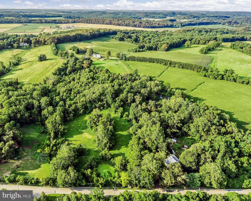 Sale includes 2 parcels. 1018 Belfast Rd w/an existing 4130 sq ft home and barn on 6.85 acres plus an adjoining parcel consisting of 4.32 acres for 11+ acres total. Home requires extensive renovations and being sold as-is. The possibilities here are endless. Option #1 Renovate this stone foundation Colonial home to its former glory (see included circa 1976 pics) and tidy up the huge solid barn to beautifully compliment the surrounding majestic Belfast Valley agricultural setting. Details such as the original ornate stairs and multiple built- ins, will make this renovation stand apart from your typical new construction project. Option #2 Keep the stone foundation and rebuild completely for your ideal modernistic home. Option #3 Subdivide the 6.85 acre parcel for 2 home sites (existing site plus another home)? Option #4 Hire your favorite builder and/or land expert to convert the Eastern most 4.32 parcel, currently listed, to a building lot and build yet another home on a super private setting OR simply keep it for additional privacy or even agricultural use. Note: All showings require the seller and/or the listing agent to be present as the property is an active horse farm.