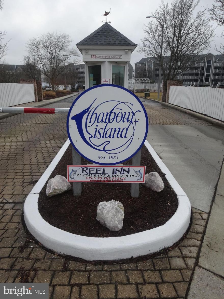 MASSIVE PRICE REDUCTION!! "HARBOUR ISLAND",! Even the name sounds magical. Do not miss this opportunity to join this highly sought after Gated community. Park your ride in the covered garage. Take the convenient elevator to your floor. Unit 304M is an oversized two bed, two bath, open floor plan, Luxury, Direct Bay front, dream of a resort home. Property features wainscoting in foyer and hall. Hardwood flooring in foyer,  hall and kitchen. Recessed lighting. Corian Counter tops with complementary backsplash. Stainless Steel appliances. Bedrooms feature black out shades. Bay side sliding doors are adorned with custom shades.
Harbour Island is the Host to the world famous White Marlin Fishing Tournament. After a short walk back from the nearby Beach and Boardwalk, you can relax on your oversized, Direct Bay front balcony. You will be constantly entertained by the activity on the water. Fabulous views of both Rt 50 and Rt 90 bridges. Be prepared to have your breath taken away by year round sunsets. Bedrooms and Living area are equipped with ceiling fans and TVs. Want more? There is a Tot Lot, Tennis courts and a Community Pool. Don't  feel like cooking?  The REEL INN restaurant is on the Island. This is a Clean, Furnished and Inviting property. Make an appointment before its too late.