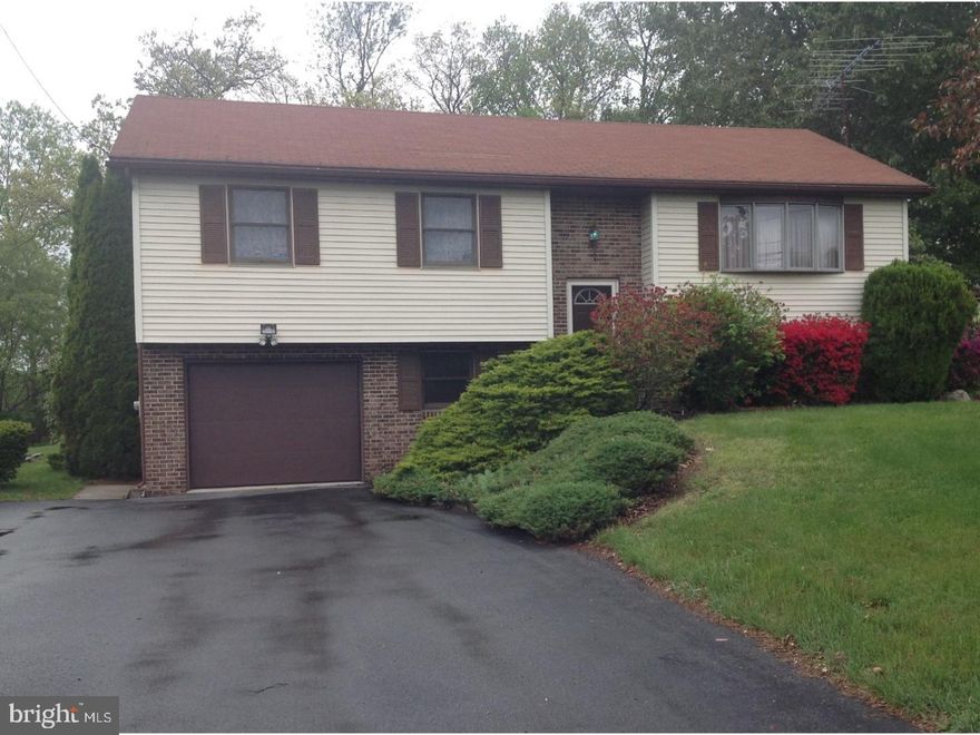 Cared for 3-4 bedroom  Bi Level in Lake Wynonah with beautiful farm views.  Attractive U shaped kitchen with breakfast bar.  Master bedroom has a half bath and sizable closet. The lower level rec room has an efficient coal stove for supplemental heating. There is plenty of storage in attic with pull down stairs.  There is a good sized deck with built in benches for entertaining friends and enjoying the lovely views. The lower level laundry room has rough plumbing for a future bathroom. There are many beautiful flowering trees and bushes to enjoy.  Lot 1741 is included in sale of house property.