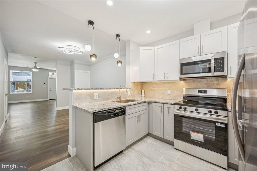 Step into elegant comfort with this beautifully completely renovated 3-bedroom, 2 bathroom home, where charm meets modern luxury. Thoughtfully redesigned from top to bottom, this home showcases a flowing open-concept layout, stylish finishes, and exceptional attention to detail throughout. The light-filled main level features wide-plank wood-style flooring and a neutral designer palette that enhances the home’s airy and inviting atmosphere. The elegant living room centers around a stunning gas fireplace with a classic mantle—perfect for cozy evenings and entertaining. At the heart of the home, the gourmet kitchen boasts granite countertops, gorgeous custom cabinetry, stainless steel appliances, and pendant lighting above a breakfast bar that opens seamlessly to the dining room.   Both bathrooms have been completely renovated with sleek, modern fixtures and tasteful tile work, offering a spa-like experience. The three spacious bedrooms provide comfort and flexibility, ideal for guests, home office space, or every day living.  Step outside to your private backyard oasis—featuring a new patio and a fully fenced yard. Whether you're enjoying morning coffee, hosting summer barbecues, or gathering around a fire pit under the stars, this space is designed for relaxation!  Additional features Include:  3 spacious bedrooms, 2 fully renovated bathrooms, gas fireplace with custom mantle, recessed and designer lighting, new heater and air conditioner, and main floor laundry room.  Nothing to do here...just move right in!  Schedule your private tour today and make an offer!