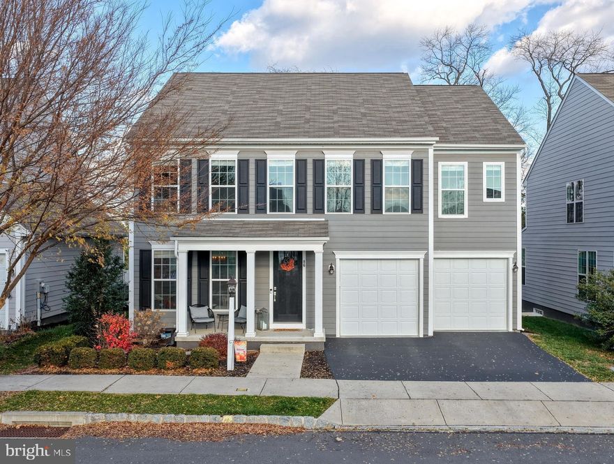 Welcome to this beautifully appointed Kenyon model, one of Charter’s most sought-after floor plans, located in the award-winning community of Walden. Thoughtfully designed with integrated parks, tree-lined walking trails, a community pool, fitness center and a charming village center featuring breweries, shops, restaurants, and more, Walden offers an unmatched lifestyle in Silver Spring Township with low taxes and highly rated Cumberland Valley Schools. This pristine residence offers nearly 2,900 SF of open, light-filled living space with soaring 9 ft ceilings and Mohawk LVP flooring throughout the main level. While the home offers an open-concept design, subtle architectural columns define each space creating a flexible front room ideal for a playroom or office, and a centrally located area perfectly suited for a formal dining room highlighted by an overhead chandelier. The spacious family room is anchored by a gas fireplace with decorative mantel and is framed by tall windows with custom treatments, bringing in exceptional natural light. The gourmet kitchen is truly impressive, featuring an abundance of soft-close white cabinetry, leathered granite countertops, a KitchenAid 5-burner gas range, stainless steel appliances, an oversized pot sink with gooseneck faucet, and a massive center island with pendant lighting and seating. A generous breakfast area opens to the newly added, beautifully curved stamped-concrete patio with a fire pit utilizing a hidden propane line. An ideal private retreat backing to the quiet outer perimeter of the neighborhood. Upstairs, a versatile loft offers the perfect secondary living area. The spacious primary suite includes impressive dual walk-in closets, ceiling fan/light, and an ensuite bath with double sinks and a walk-in glass shower. Three additional well-sized bedrooms, a hall bath with tub/shower combo, and a convenient second-floor laundry room with utility sink and gas dryer hookup. The expansive lower level provides a blank canvas for future finishing, already equipped with a full bath rough-in, air-flow fan, integrated sump pump and radon mitigation system. Additional upgrades include energy-efficient gas heat and hot water, Honeywell zone dampers for separate level temperature control, Honeywell home security system, abundant recessed lighting, beautiful designer-neutral paint, and a two-car garage leading into a well-organized mudroom drop zone. Built in 2019 and exceptionally maintained, this home offers modern efficiency, timeless design, and a bright, open floor plan - all in one of the region’s most desirable communities.