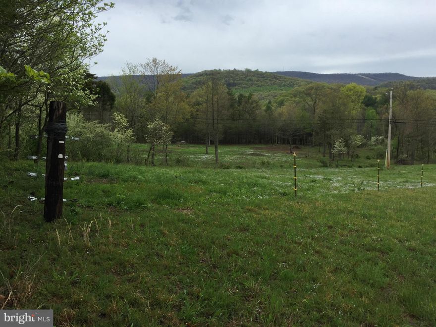 "REDUCED PRICE"This 2.764 acres is simply a beautiful property. It is ready to build on right now. Land is partially fenced and cleared yet has trees and tree boundaries, Property has well and septic permits and approved entrance permit from Golliday Lane. Has 317 ft. road frontage on WV 9 and 423 ft. on Golliday Lane. Mountain view and close to the Cacapon River. Totally Awesome. .